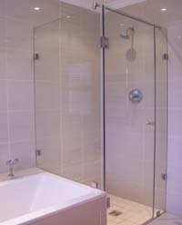 Frameless showers next to bath
