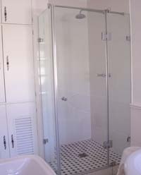Frameless showers with panels